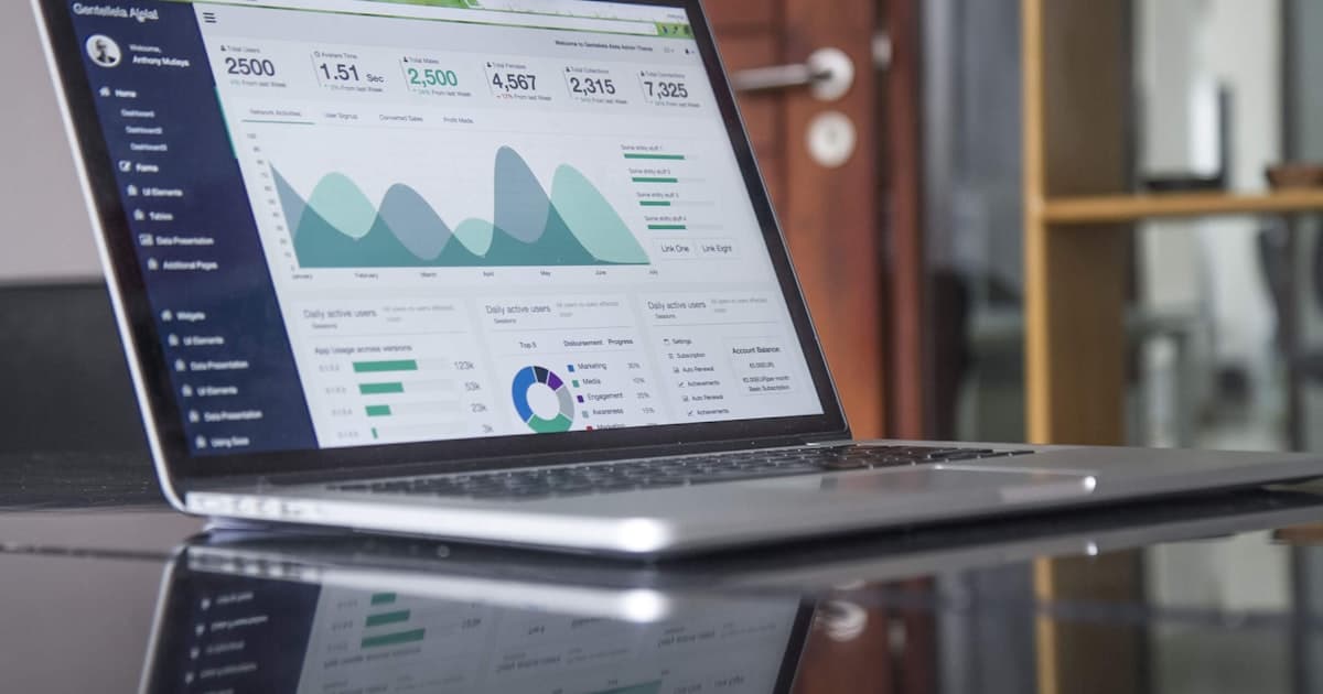 Business tools comparison on a laptop screen