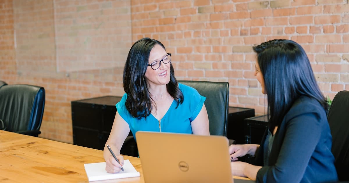 Sales manager reviewing daily sales activity on a laptop